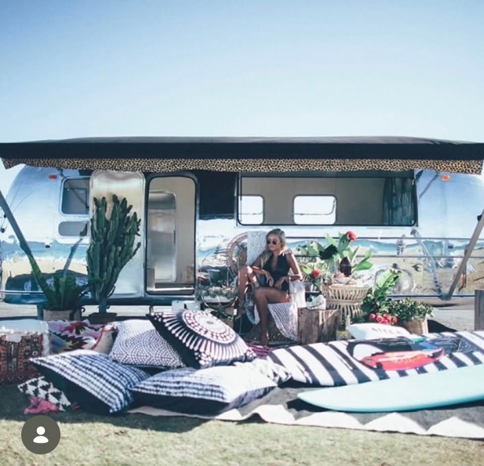 Billabong beach activation with surfboards, cushions and styled outdoor lounge